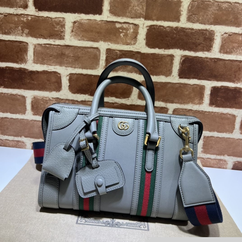 G*u*i top handle bags